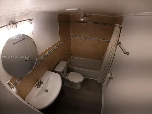 view of a bathroom with a tub