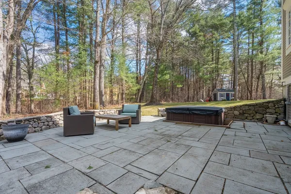 a view of backyard with seating space
