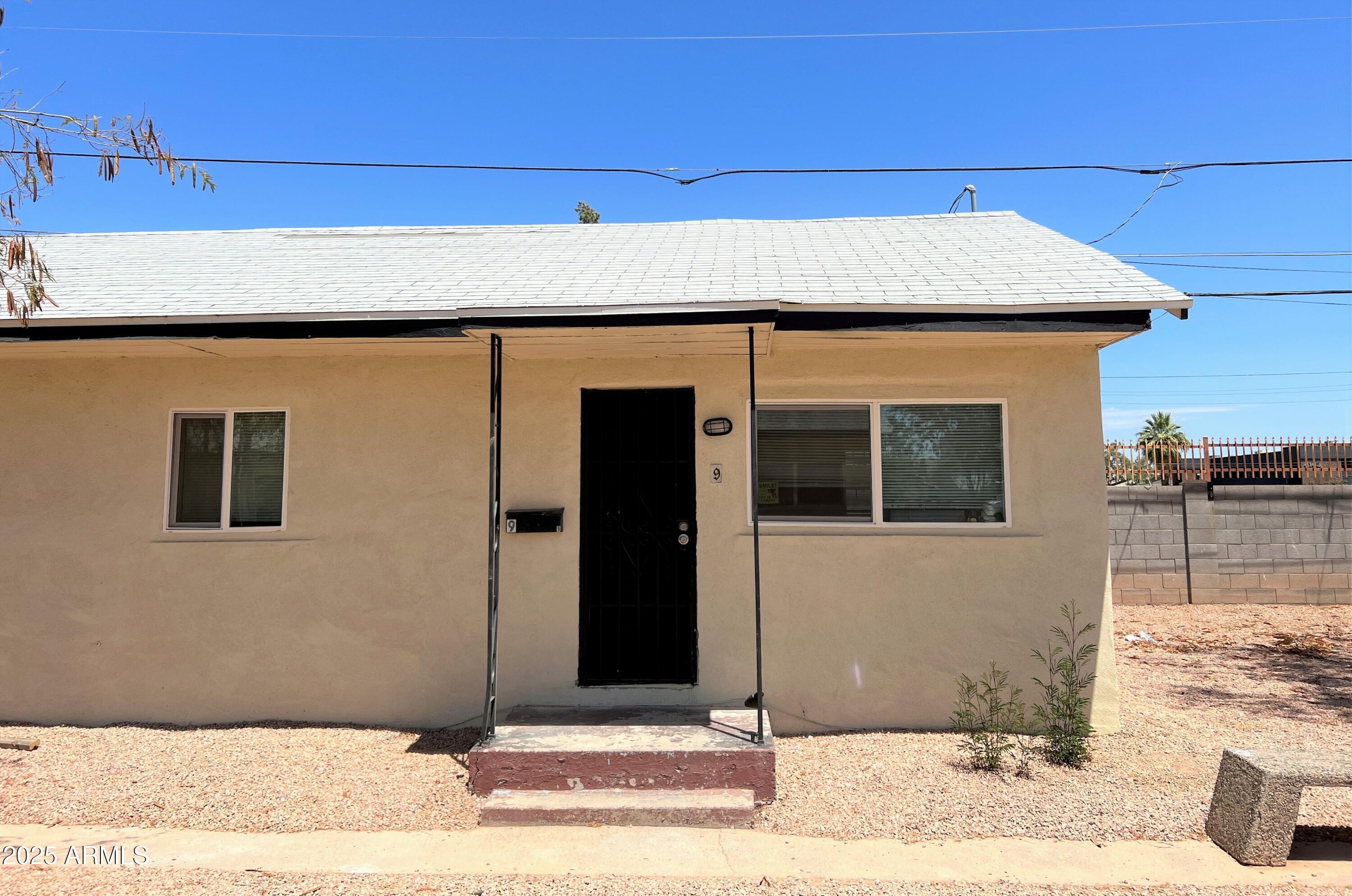 1125 East Devonshire Avenue, Unit 9 Phoenix, AZ 85014 - Photo 11 of 11 a front view of a house