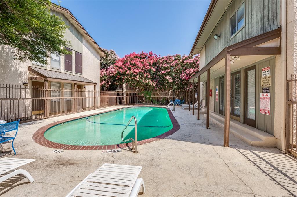 12816 Midway Road, Unit 1066 Dallas, TX 75244 - Photo 24 of 25 a swimming pool with yard outdoor seating and yard