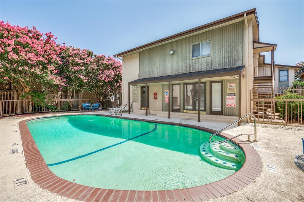 12816 Midway Road, Unit 1066 Dallas, TX 75244 - Photo 25 of 25 a view of a house with swimming pool