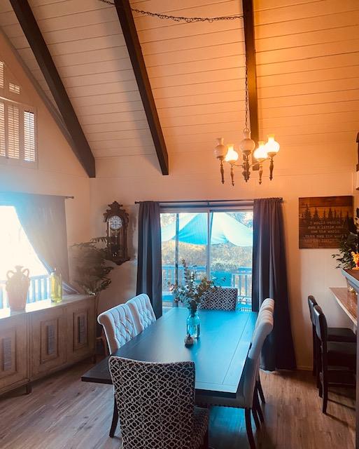 2423 Quail Hill Road Copperopolis, CA 95228 - Photo 5 of 17 a view of a dining room with furniture window and wooden floor
