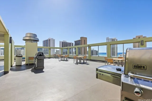 a view of a livingroom with furniture and a flat screen tv