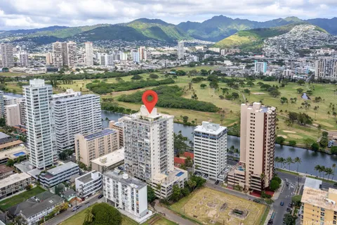 a view of city with ocean