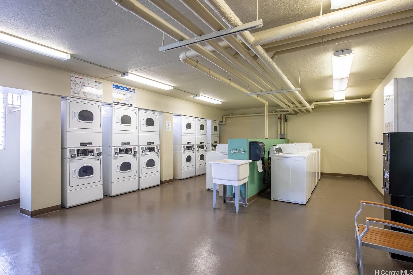 2452 Tusitala Street, Unit 908 Honolulu, HI 96815 - Photo 10 of 19 a view of a room with workspace and a window