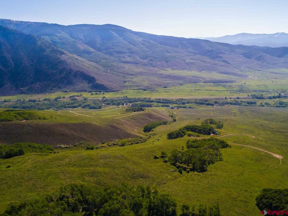 1383 Lariat Road Almont, CO 81210 - Photo 27 of 35 a view of an ocean and a mountain