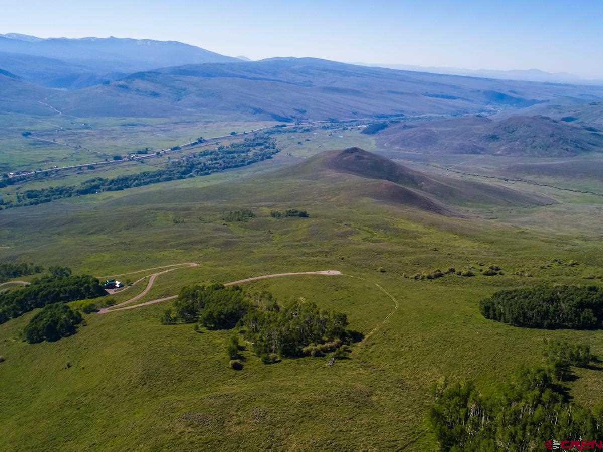 1383 Lariat Road Almont, CO 81210 - Photo 34 of 35 a view of a lake with a mountain