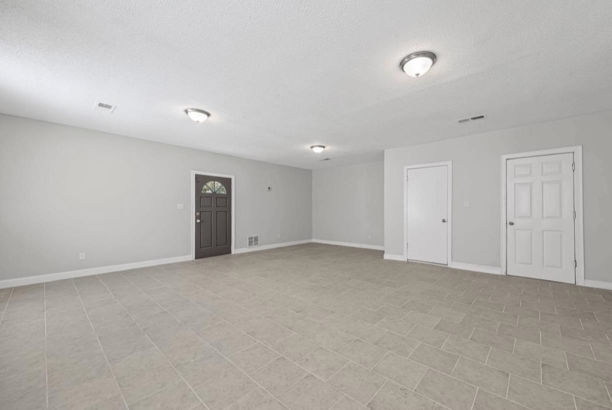 3843 Blue Jay Road Memphis, TN 38116 - Photo 9 of 23 an empty room with an entryway