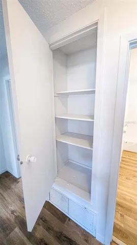 a bathroom with a toilet and a bathtub