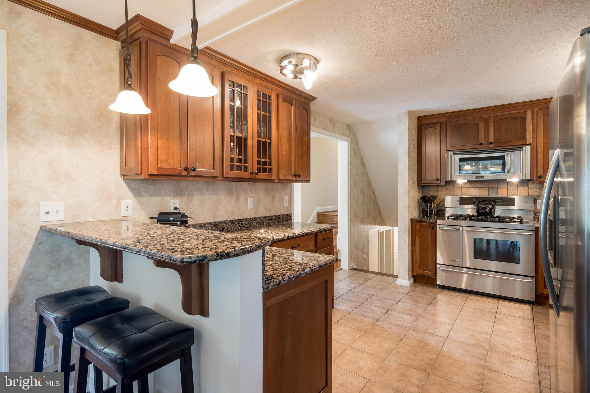 16 Northampton Road Lutherville-Timonium, MD 21093 - Photo 11 of 42 Breakfast Bar & Designer Lighting