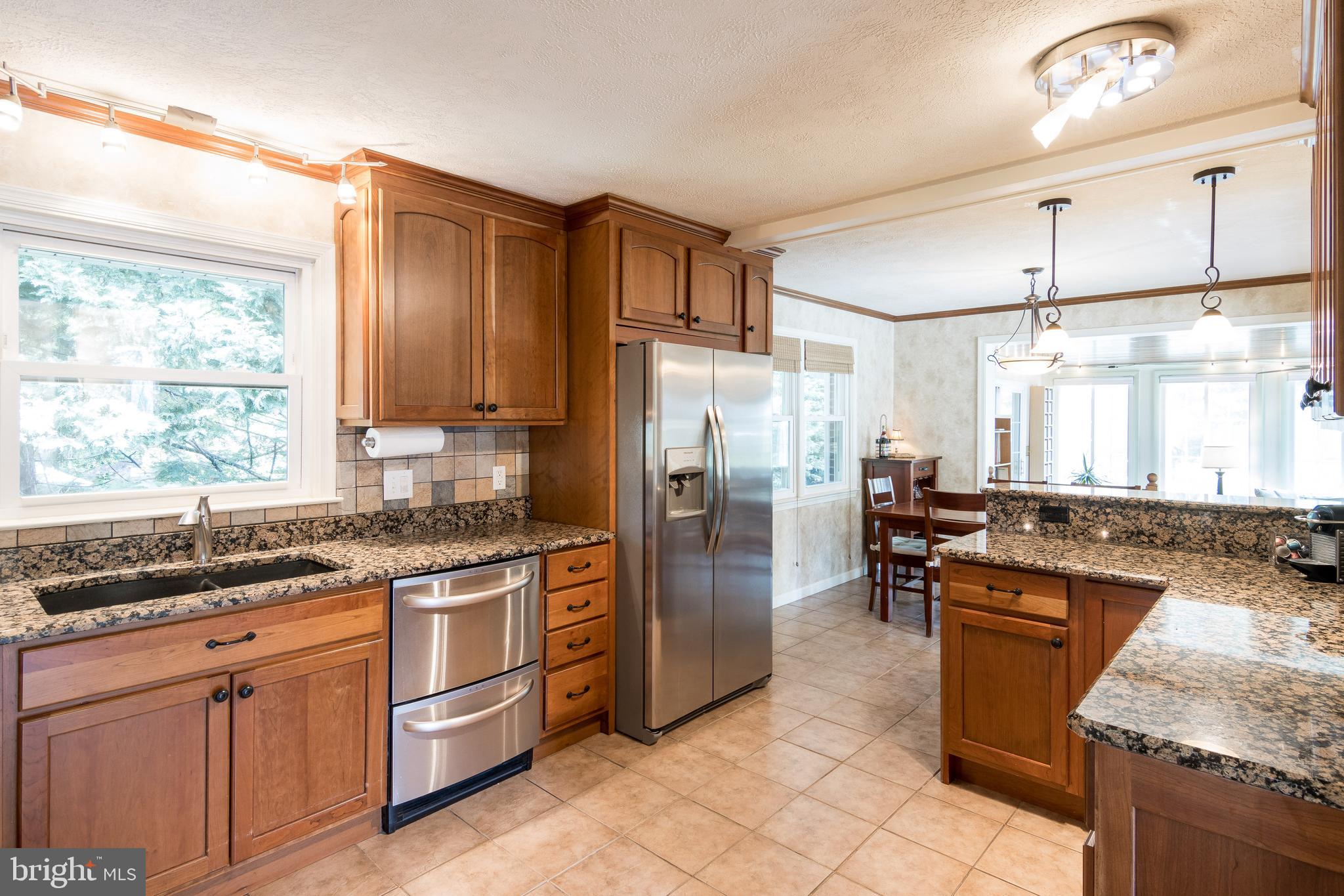 16 Northampton Road Lutherville-Timonium, MD 21093 - Photo 12 of 42 Looking ACross Kitchen to Open Dining Room
