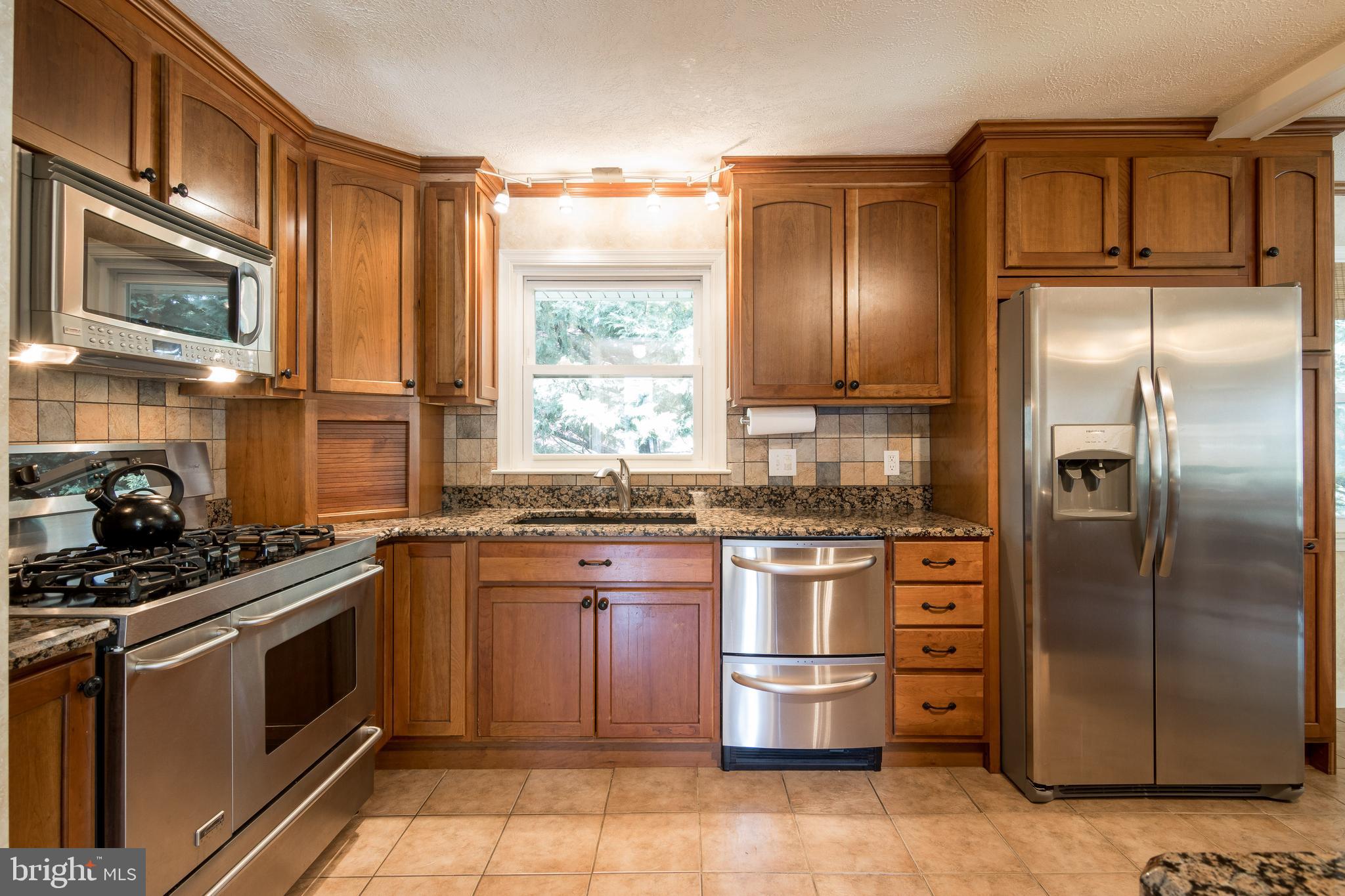 16 Northampton Road Lutherville-Timonium, MD 21093 - Photo 8 of 42 Beautiful Granite Kitchen With Cherry Cabinet