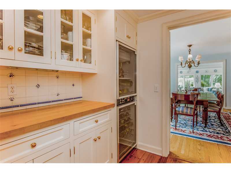 490 Hollow Tree Ridge Road Darien, CT 06820 - Photo 15 of 25 a view of a kitchen with furniture and staircase