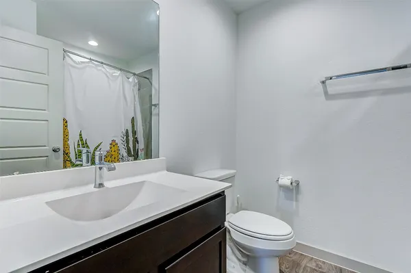 a bathroom with a sink and a toilet