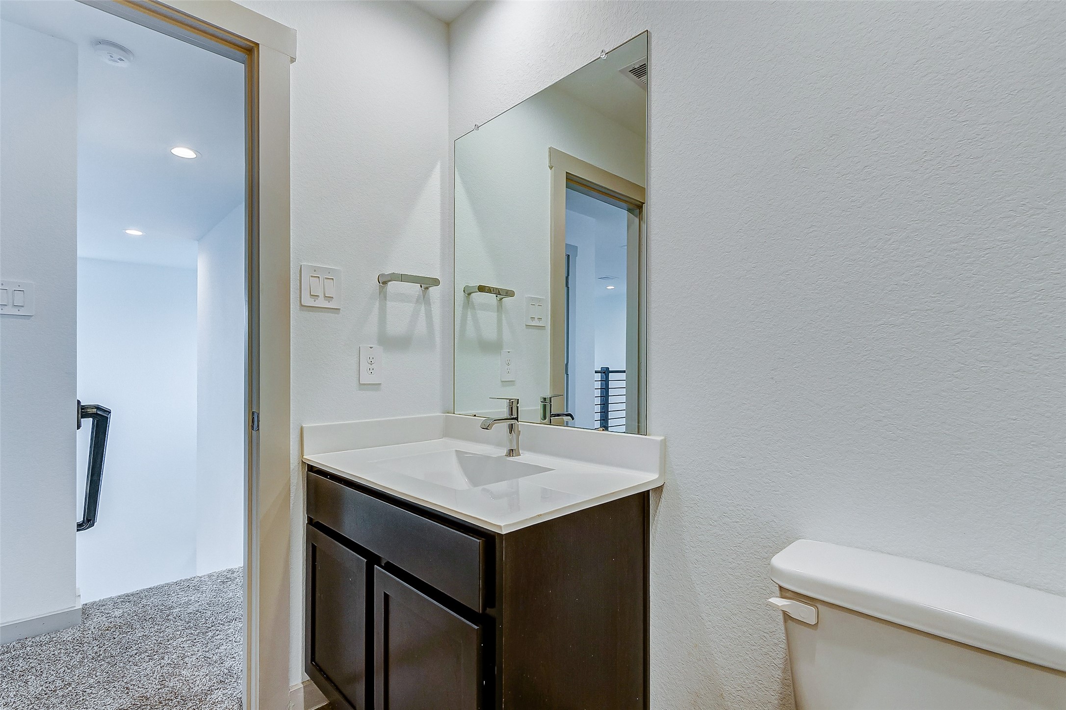 12514 Walmgate Court Houston, TX 77047 - Photo 27 of 37 a bathroom with a sink toilet and mirror