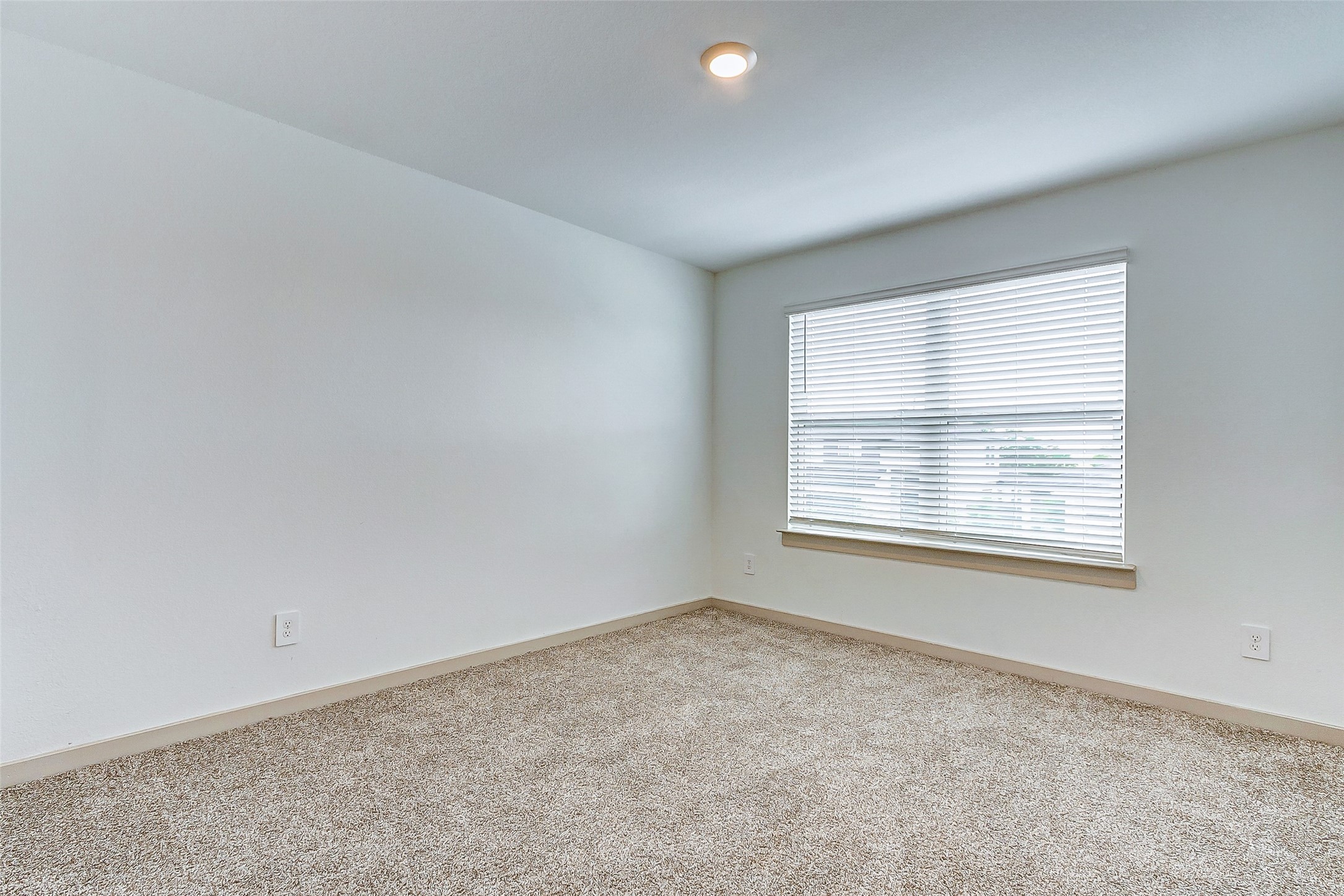 12514 Walmgate Court Houston, TX 77047 - Photo 30 of 37 an empty room with a window