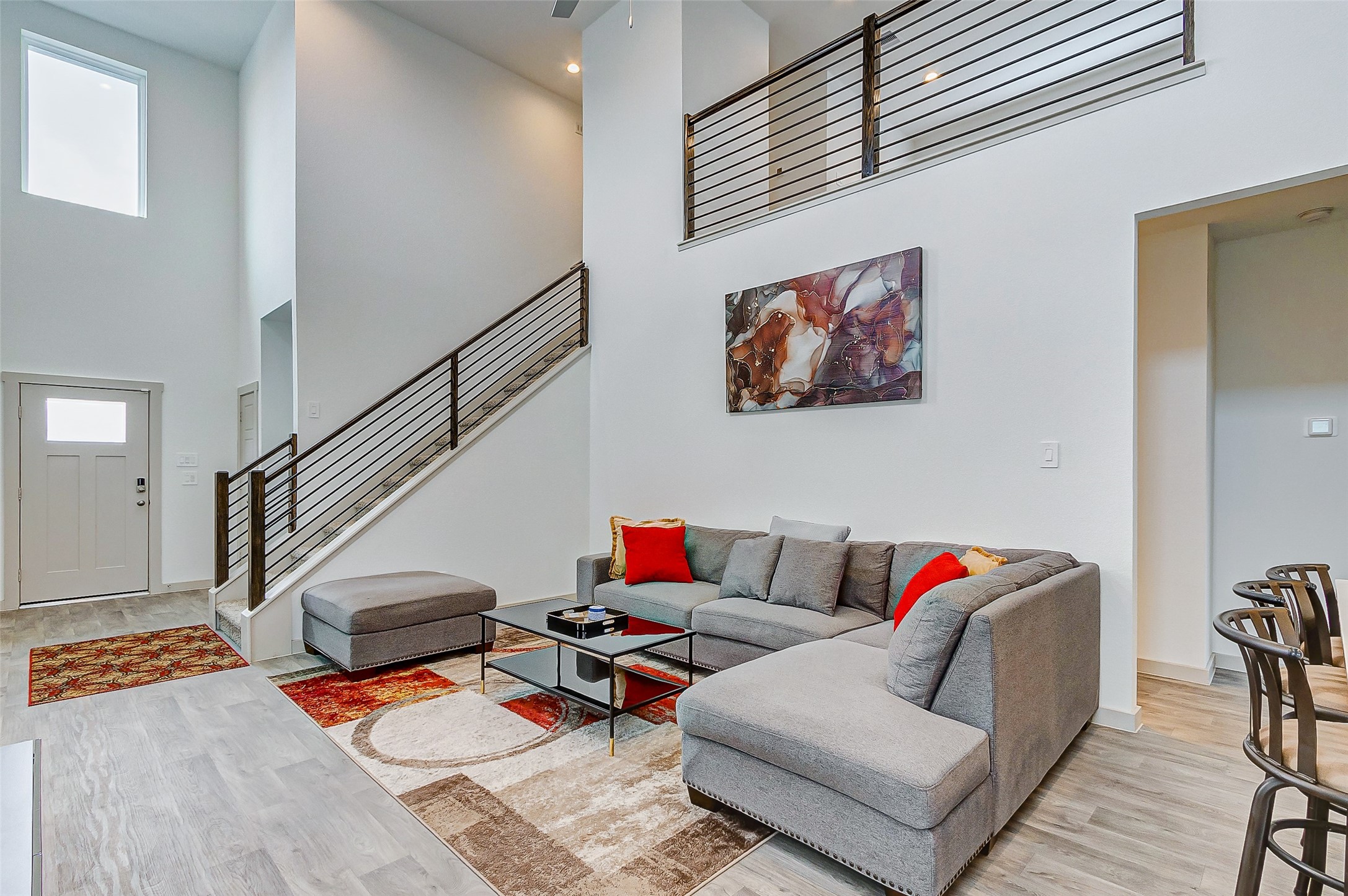 12514 Walmgate Court Houston, TX 77047 - Photo 9 of 37 a workspace with furniture and stairs