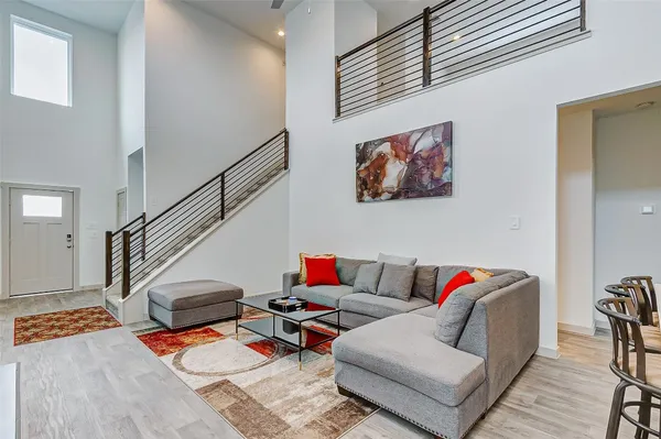 a workspace with furniture and stairs