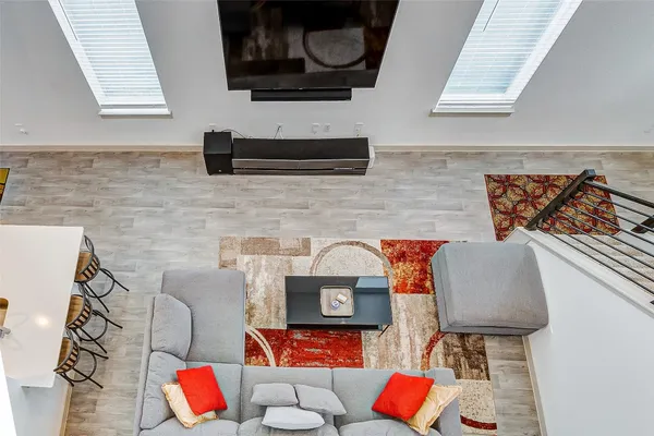 a bathroom with a sink mirror and vanity