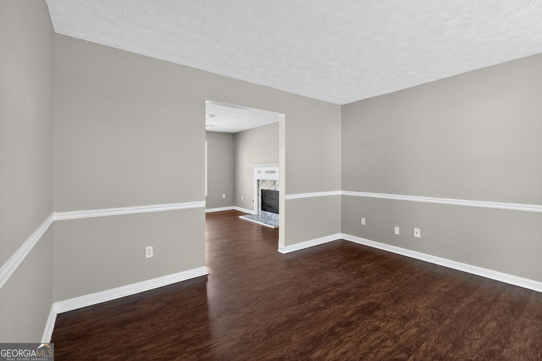 2391 Harmony Ridge Court Lithonia, GA 30058 - Photo 12 of 35 a view of an empty room with wooden floor