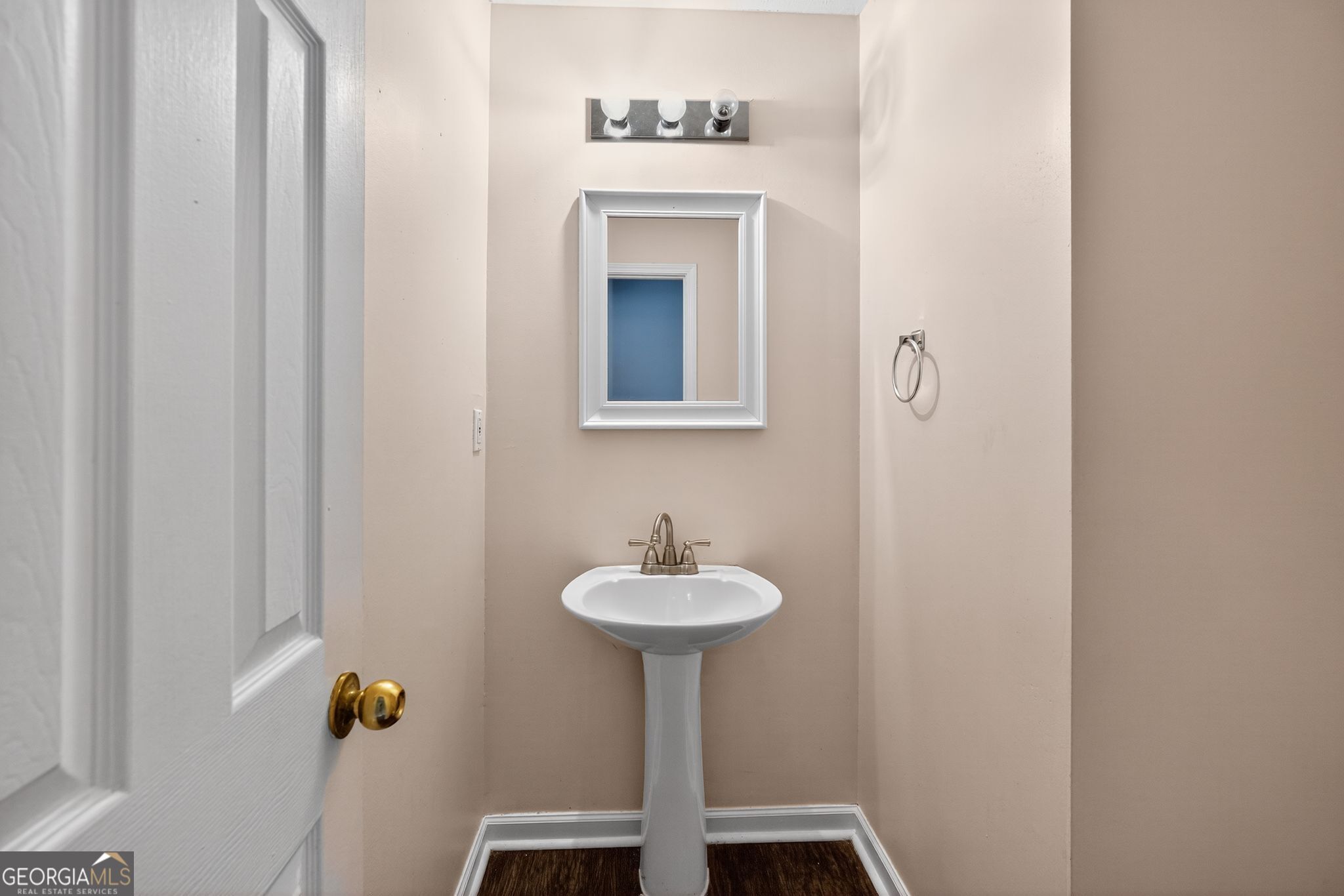 2391 Harmony Ridge Court Lithonia, GA 30058 - Photo 23 of 35 a bathroom with a sink and a mirror