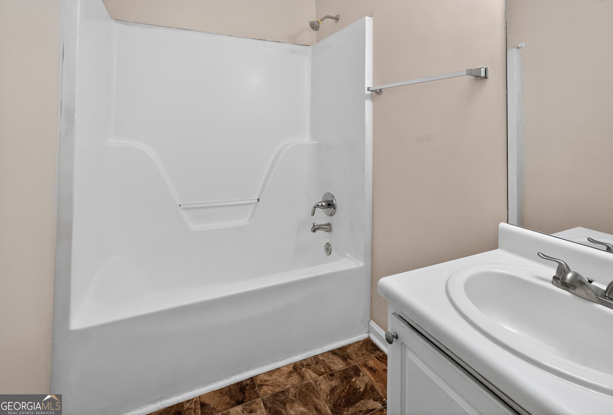 2391 Harmony Ridge Court Lithonia, GA 30058 - Photo 24 of 35 a bathroom with a sink and a bathtub