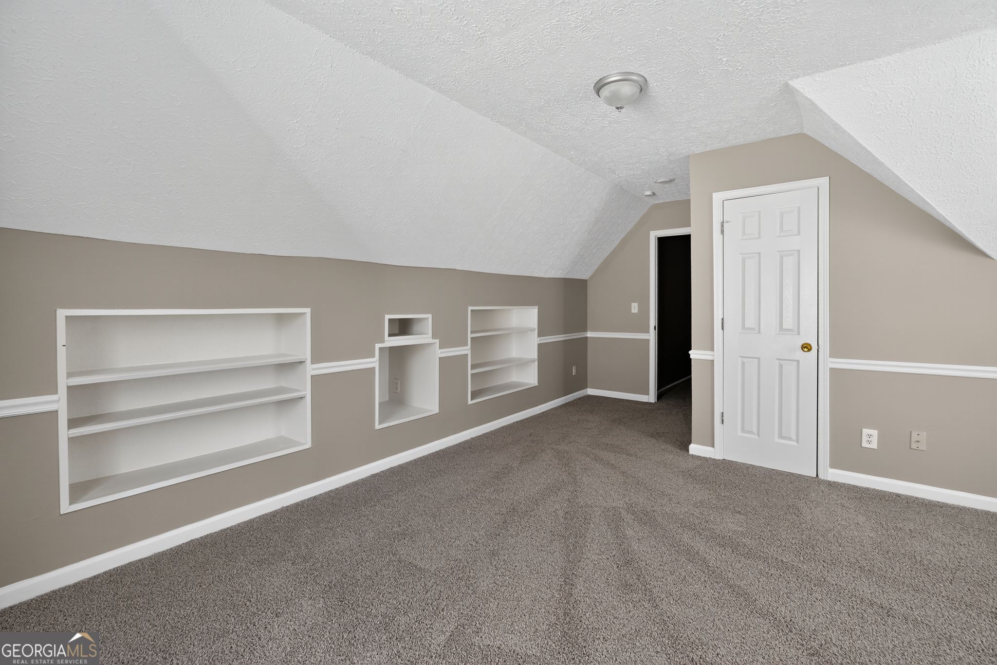 2391 Harmony Ridge Court Lithonia, GA 30058 - Photo 28 of 35 a view of an empty room with a fireplace and windows
