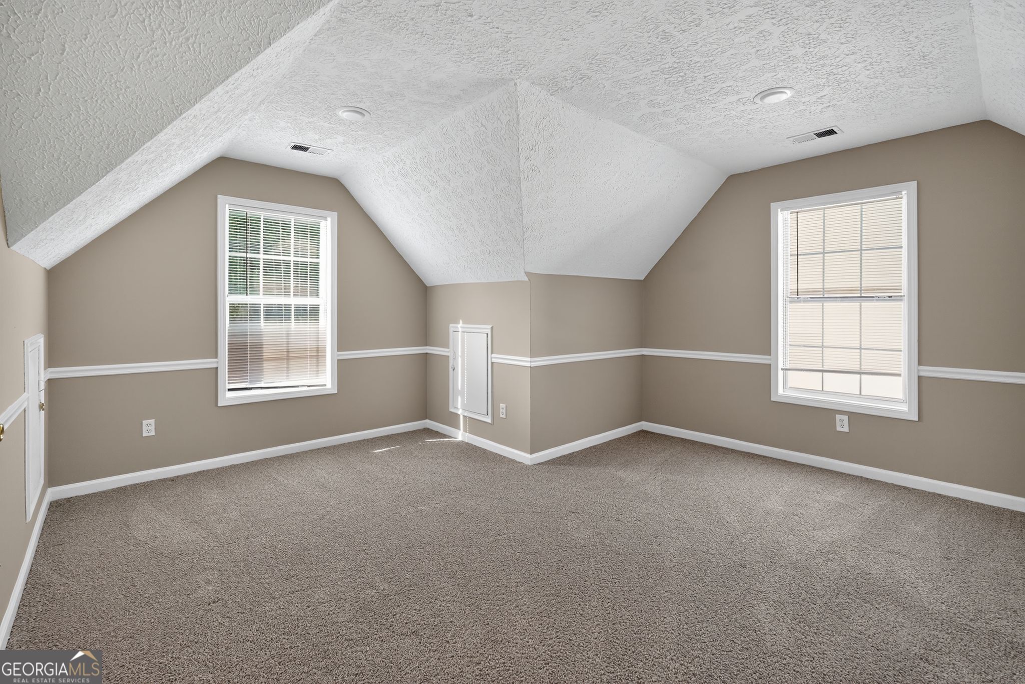 2391 Harmony Ridge Court Lithonia, GA 30058 - Photo 29 of 35 an empty room with windows
