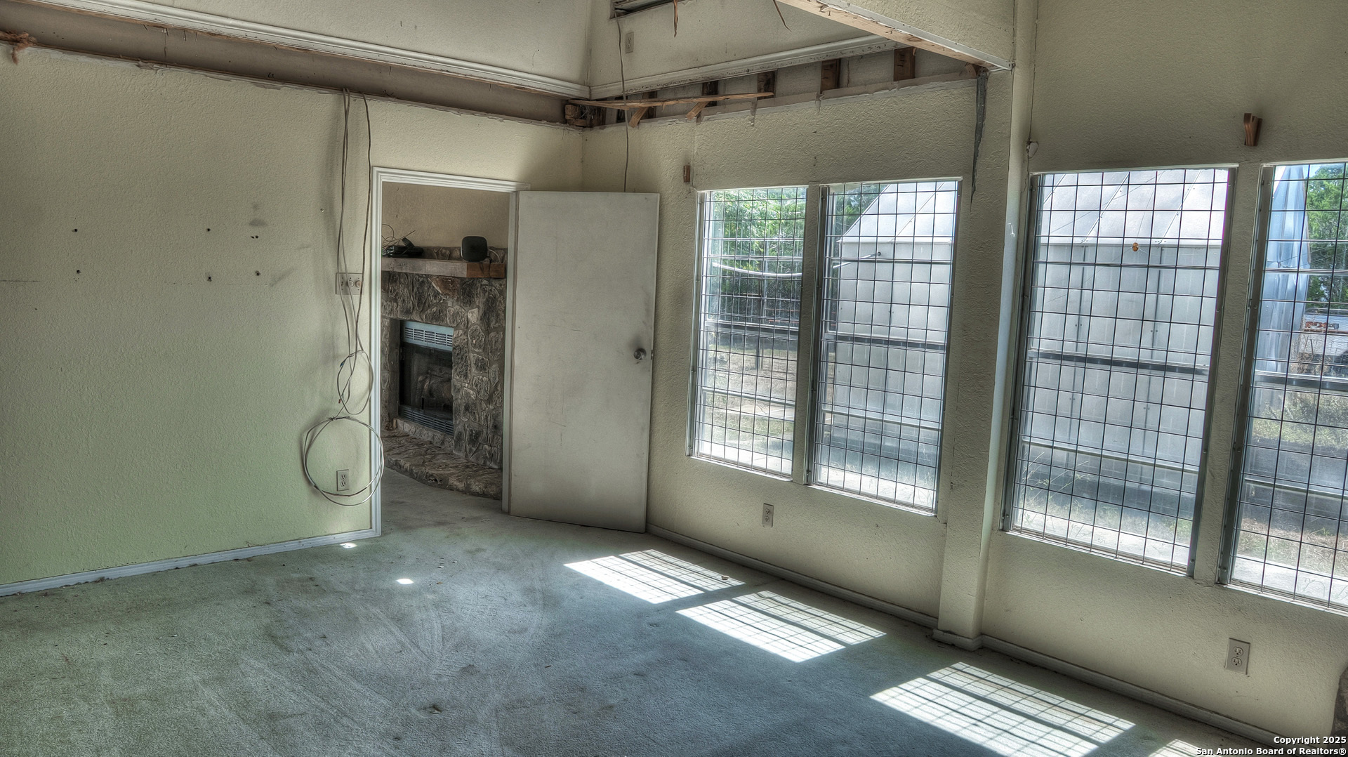 227 Mitchell Ranch Road Camp Wood, TX 78833 - Photo 12 of 72 a view of livingroom with window