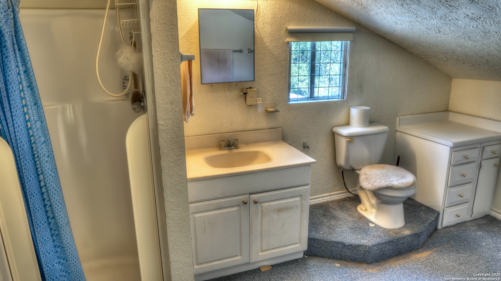 227 Mitchell Ranch Road Camp Wood, TX 78833 - Photo 14 of 72 a bathroom with a sink and a toilet
