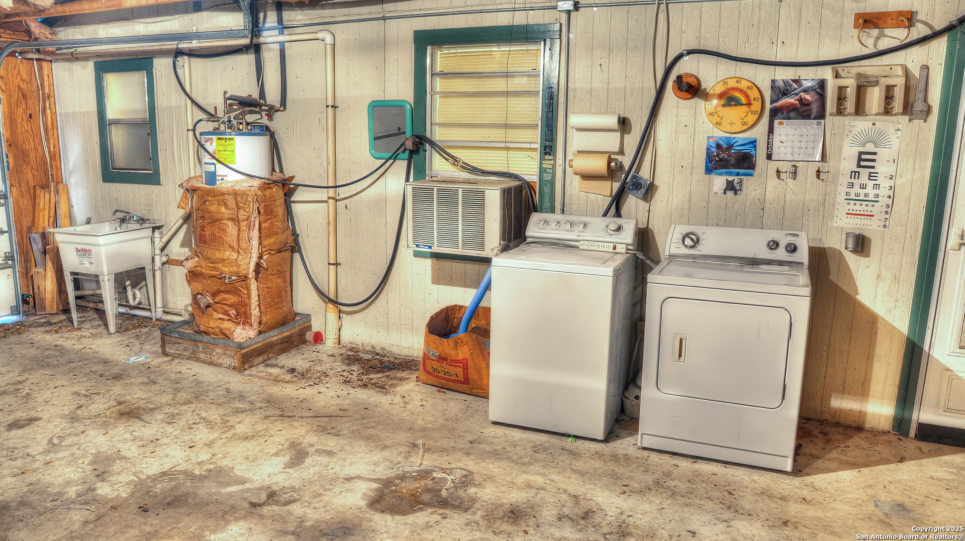 227 Mitchell Ranch Road Camp Wood, TX 78833 - Photo 18 of 72 a utility room with dryer and washer