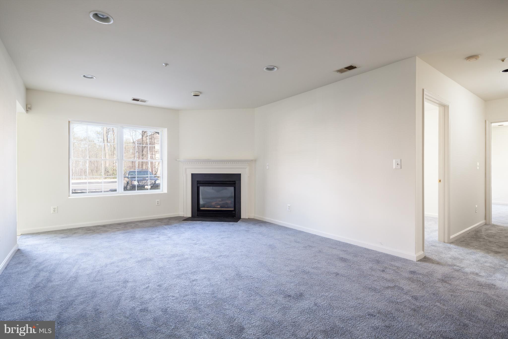 12340 Rosslare Ridge Road, Unit 101 Lutherville-Timonium, MD 21093 - Photo 7 of 14 Living Room with space for a dining room table!