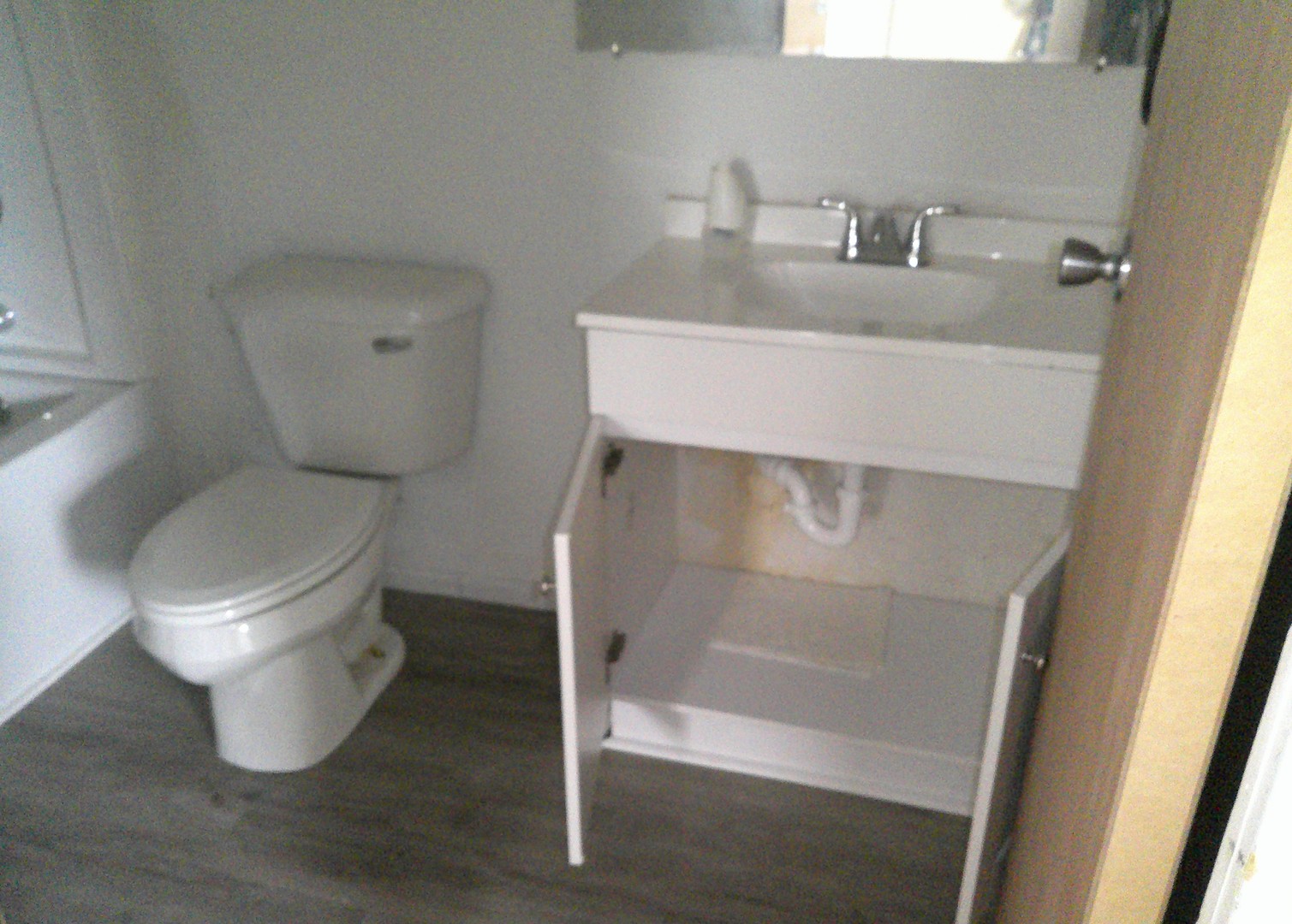 1507 Thornton Drive Champaign, IL 61821 - Photo 10 of 16 a white toilet sitting next to a sink