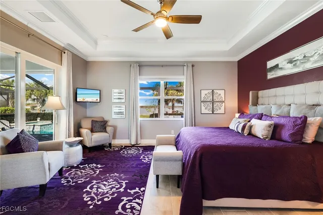 a bedroom with a large bed and a couch