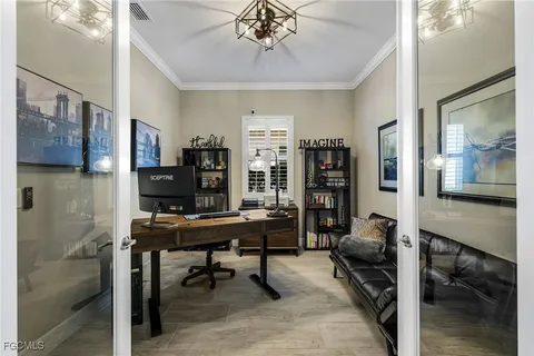 a view of a workspace with furniture