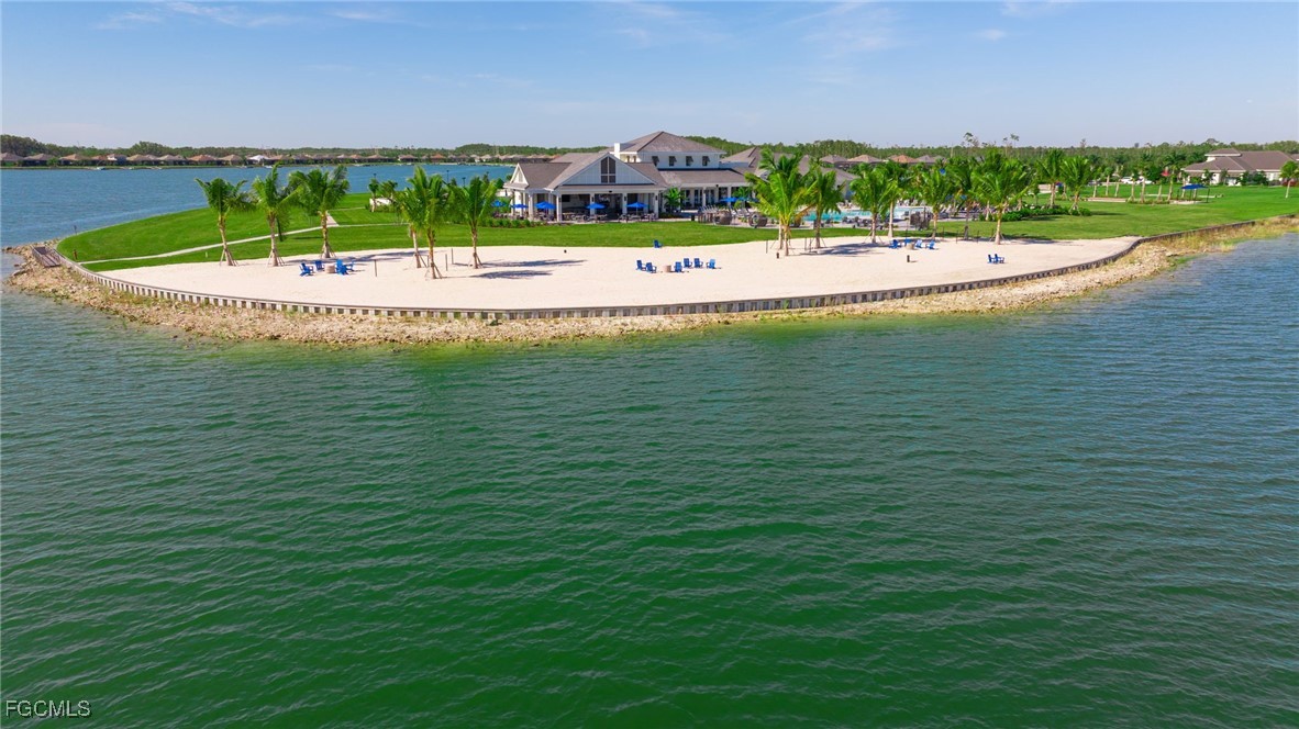 13424 Blue Bay Circle Fort Myers, FL 33913 - Photo 34 of 45 a view of a swimming pool and a yard
