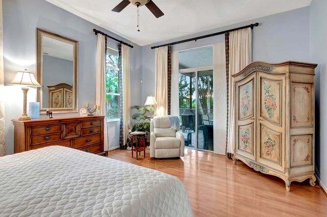 a bathroom with a sink a large mirror and a bathtub