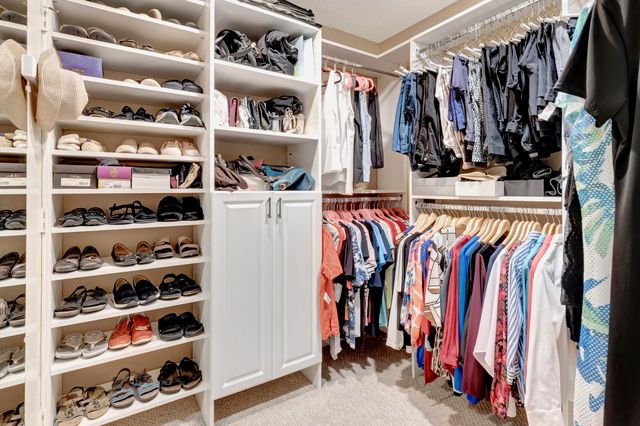 a kitchen with granite countertop cabinets and sink