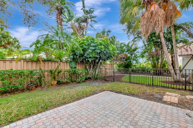 an aerial view of a houses with outdoor space and street view