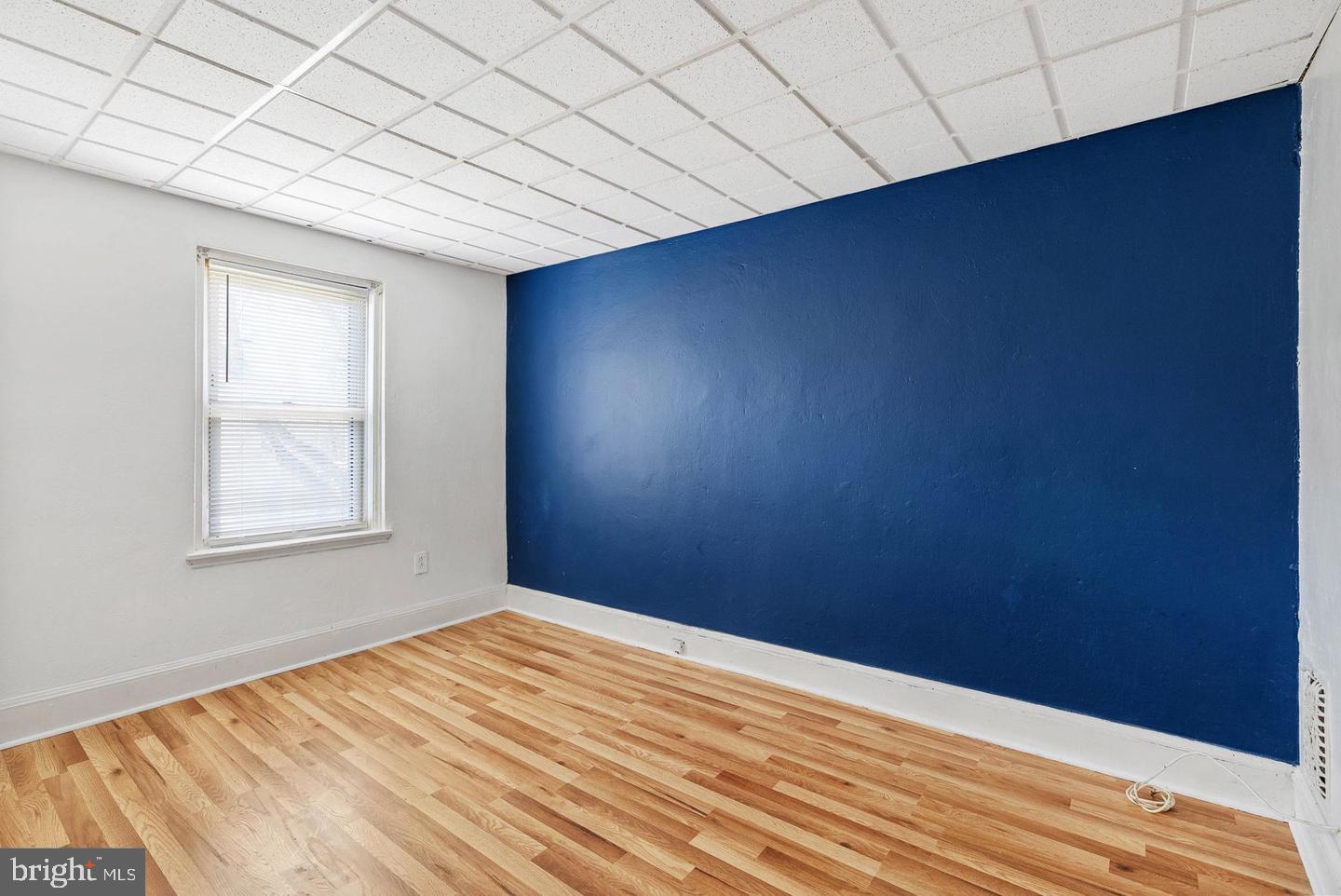 2788 North Constitution Road Camden, NJ 08104 - Photo 12 of 20 Bright space with bold blue accent wall.