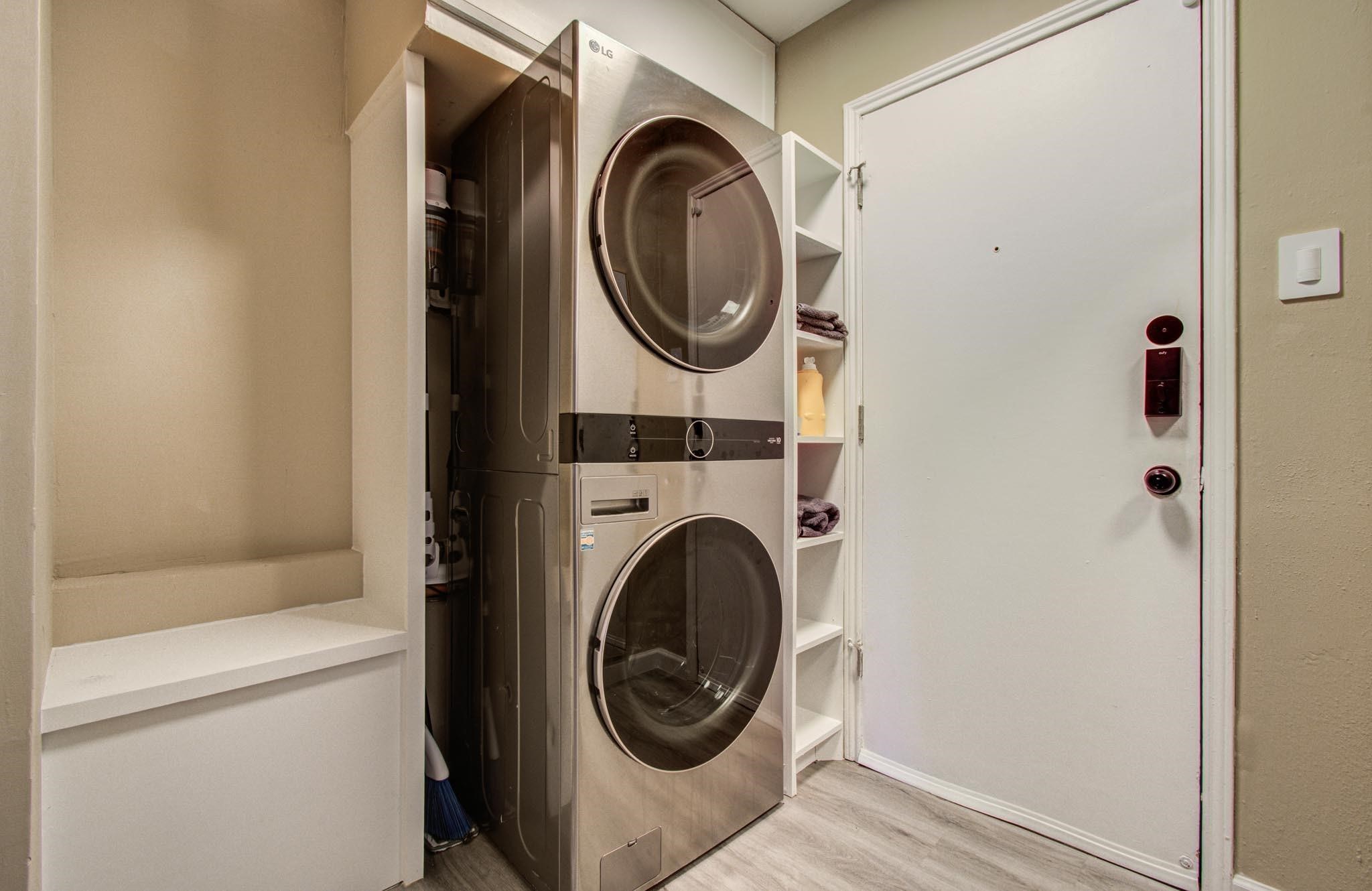4641 Wild Indigo Street, Unit 433 Houston, TX 77027 - Photo 16 of 21 a utility room with dryer and washer