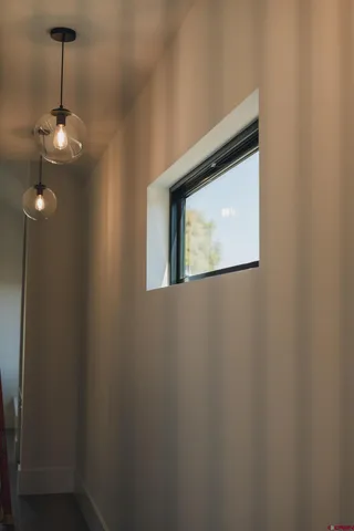 a view of a livingroom with a washer and dryer