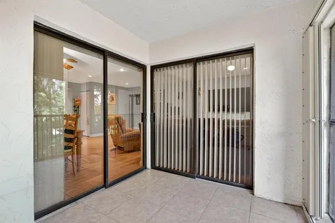 a bathroom with a sink a mirror and toilet
