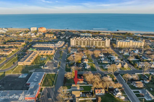 a view of city with ocean