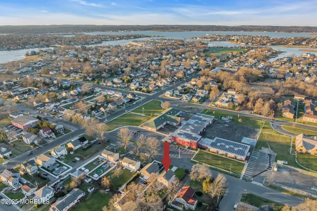 an aerial view of residential building with outdoor space