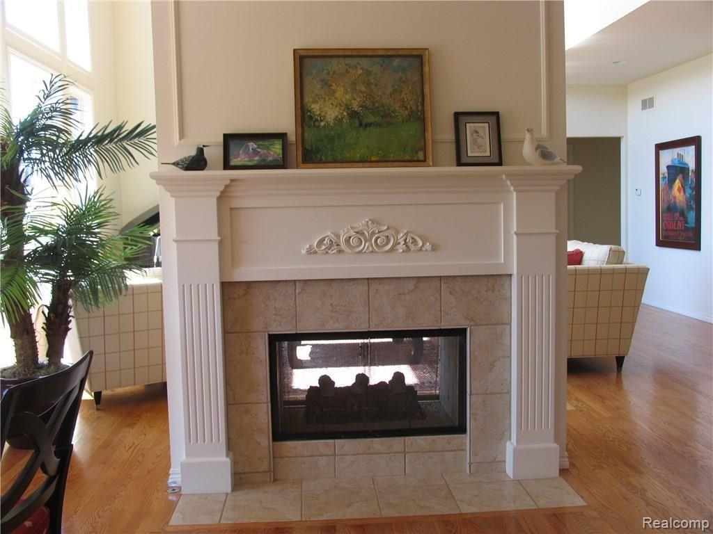 2899 North Addison Circle Rochester, MI 48306 - Photo 19 of 41 KITCHEN/FAMILY ROOM FIREPLACE