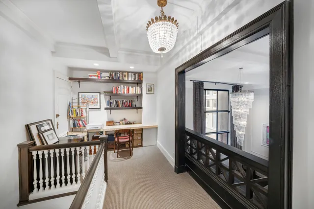 a view of a room with furniture window and wooden floor