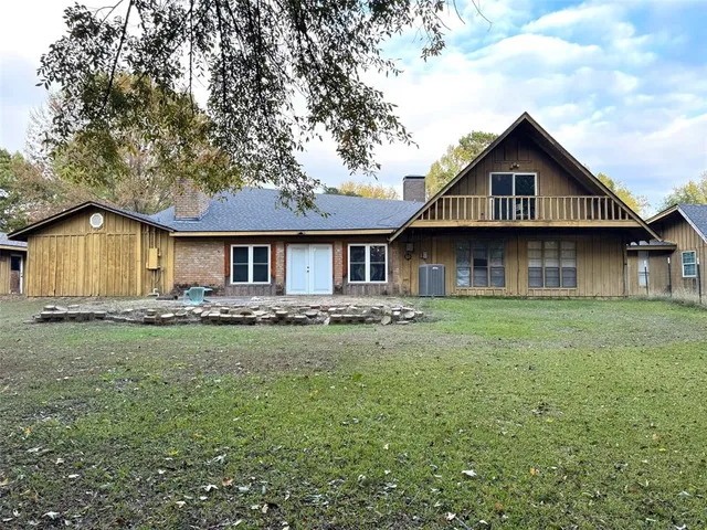 a front view of a house with yard