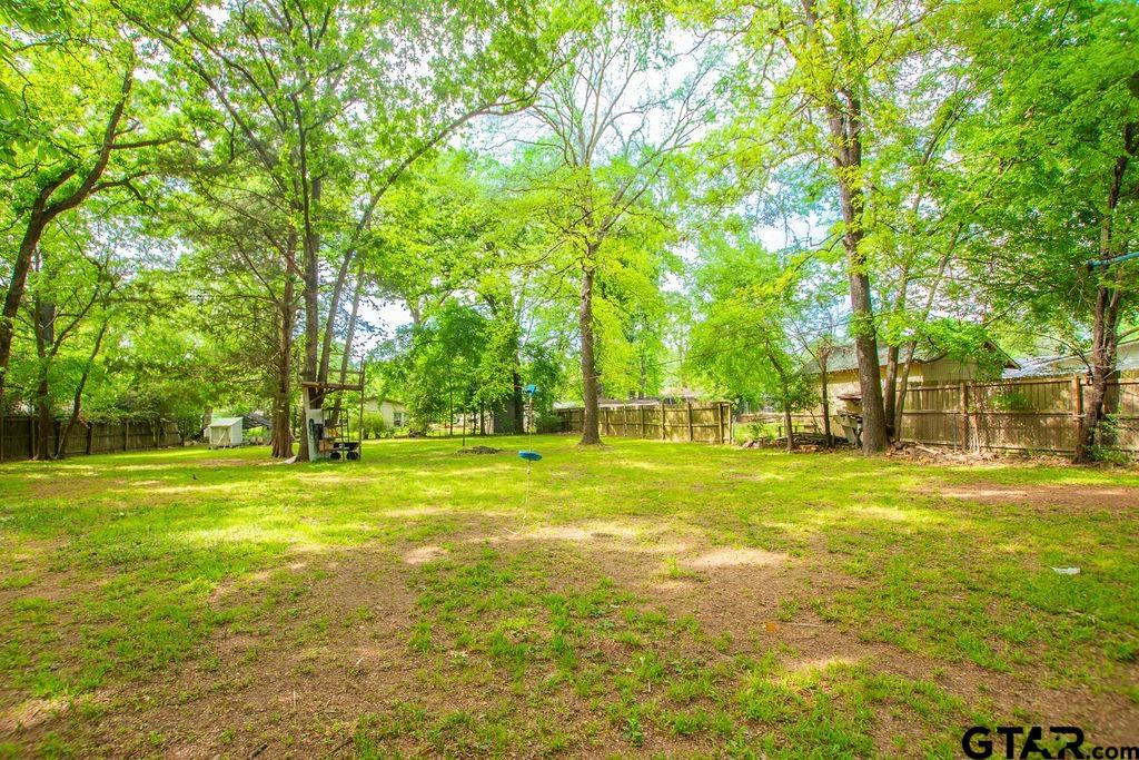 2110 Inwood Circle Tyler, TX 75701 - Photo 42 of 44 a view of a trees in a yard