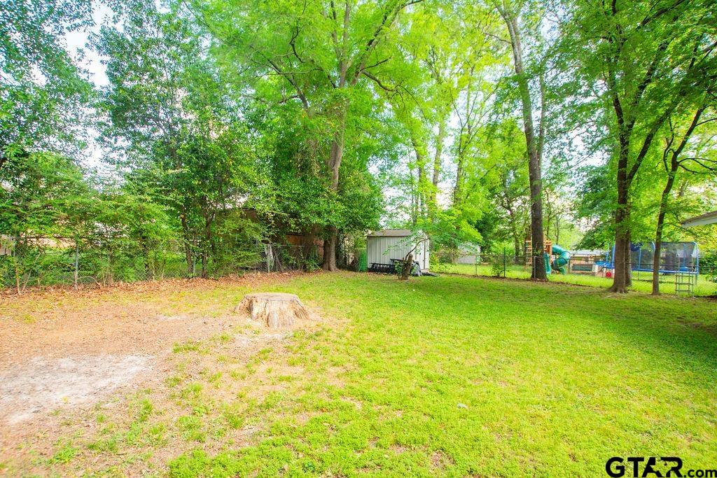 2110 Inwood Circle Tyler, TX 75701 - Photo 44 of 44 a view of swimming pool with trees